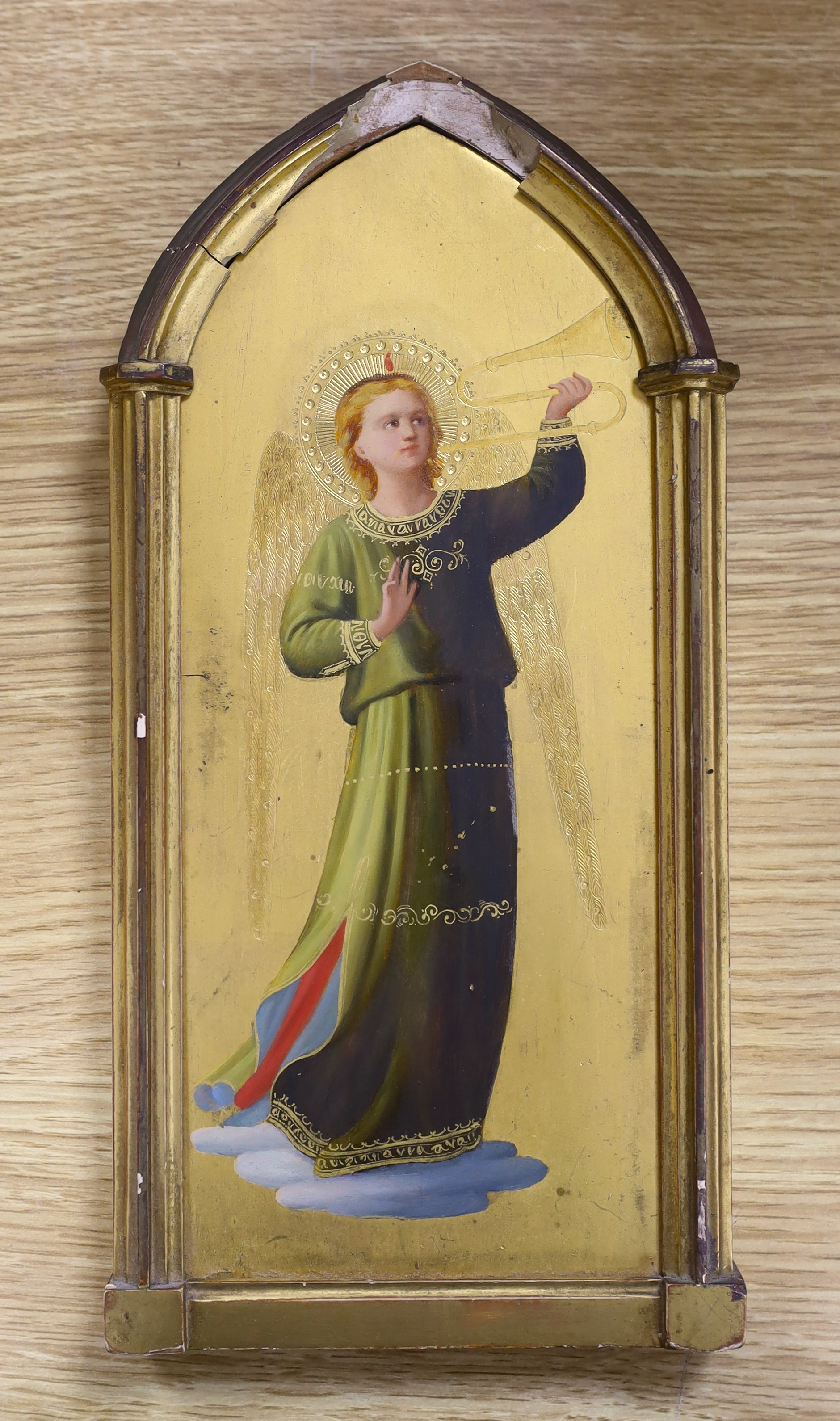 Oil on gilt panel, Heralding angel, housed in a Gothic arched gilt frame, 25 x 10cm